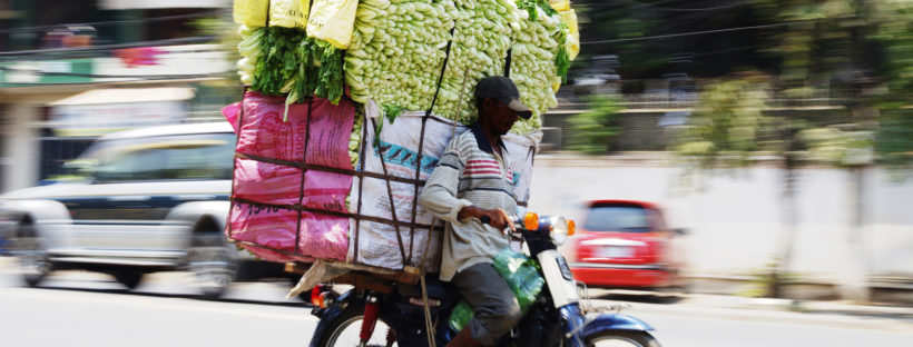 Cambodian Moto Dup delivering groceries